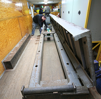Inside our mobile test bed we have installed a 27 ft long 150,000 lbs capacity test bed.