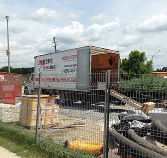 Unirope Field Service crew on a construction site doing inspection and proof testing.