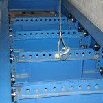 The lower connection points are four (4) free floating beams which can combined into any configuration to suit the test piece attachments points.